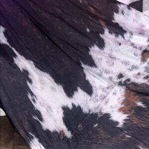 2 panels cow print curtains, rod pocket. App. 90 long and 40.5 wide, OFFERS!!